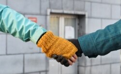 Climate activists form a human chain in Brussels, Belgium, Dec. 8, 2019.