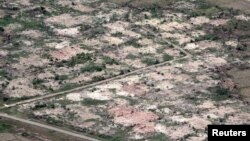 An aerial view shows burned down villages once inhabited by the Rohingya as seen from Myanmar military helicopters that carried the U.N. envoys to northern Rakhine state, Myanmar, May 1, 2018.