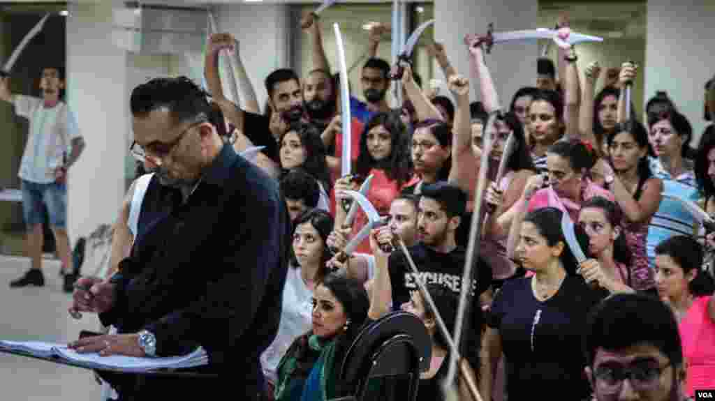 Maestro Maroun Rai, in the foreground, is one of the main figures behind the production. (Photo: John Owens for VOA)