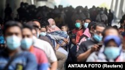 Coronavirus disease (COVID-19) vaccination as cases surge in Sidoarjo