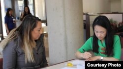Green card holders attend a citizenship clinic in Rockville, Maryland. Under the New Americans campaign, local organizations offer free services to help legal residents become American citizens. (Courtesy: AAJC)