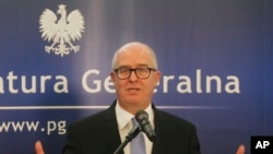 FILE - Poland’s Prosecutor General Andrzej Seremet tells a news conference in Warsaw, June 19, 2014.