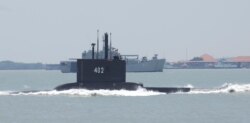 FILE - Indonesian Navy's submarine KRI Nanggala-402 sails in Surabaya, East Java province, Indonesia, Sept. 25, 2014. (M Risyal Hidayat/Antara Foto/via Reuters)