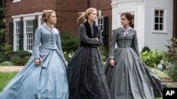 This image released by Sony Pictures shows, from left, Florence Pugh, Saoirse Ronan and Emma Watson in a scene from "Little Women," one of the best picture nominees announced January 13, 2019. (Wilson Webb/Sony Pictures via AP)