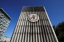 FILE - The headquarters of the World Health Organization in Geneva, Switzerland, May 18, 2020.