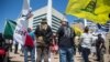 Gun advocates stage a counter-protest in response to protesters opposing the NRA's annual convention on Saturday, May 5, 2018 in Dallas, Texas.