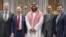 An alternative crop from a file handout picture released by the Saudi Royal Palace on November 9, 2016 shows Saudi Arabia's Crown Prince Mohammed bin Salman (C) posing for a picture with Amazon chief, Jeff Bezos (2nd L)