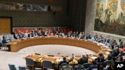 FILE - The United Nations Security Council votes on a new sanctions resolution that would increase economic pressure on North Korea to return to negotiations on its missile program at U.N. headquarters, Aug. 5, 2017.