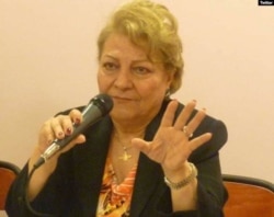 FILE - Iranian women's rights activist Giti Pourfazel is pictured in this undated photo shared on social media.