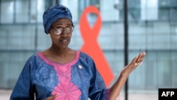 FILE - UNAIDS Executive Director Winnie Byanyima answers in Geneva, July 3, 2020.