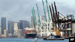 A container ship is docked at the Port of Miami, Monday, Feb. 5, 2018, in Miami Beach, Fla. 