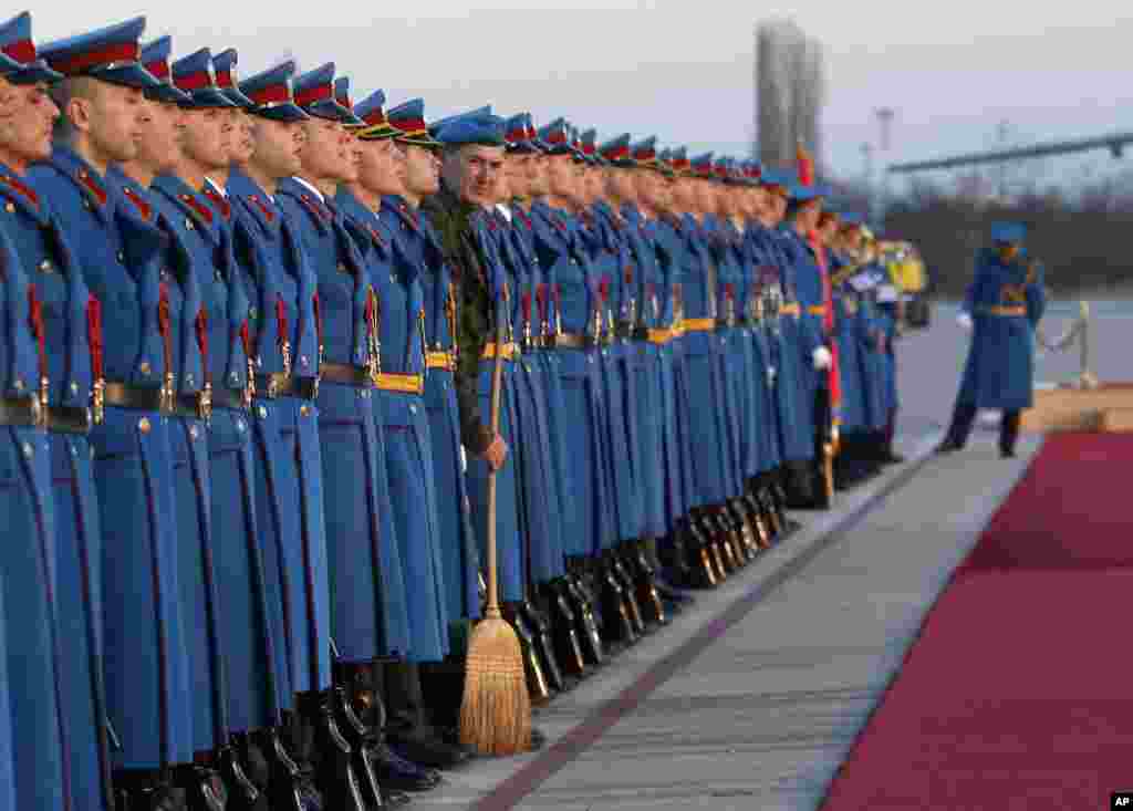 Members of the Serbian Honor guard prepare for the welcoming ceremony for Hungary&#39;s Prime Minister Viktor Orban, at the Constantine the Great Airport, in the town of Nis, Serbia.