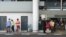 FILE: People stand at the arrival area at Phnom Penh International Airport, in Phnom Penh, on Jan. 24, 2020. (Khan Sokummono/VOA Khmer) 