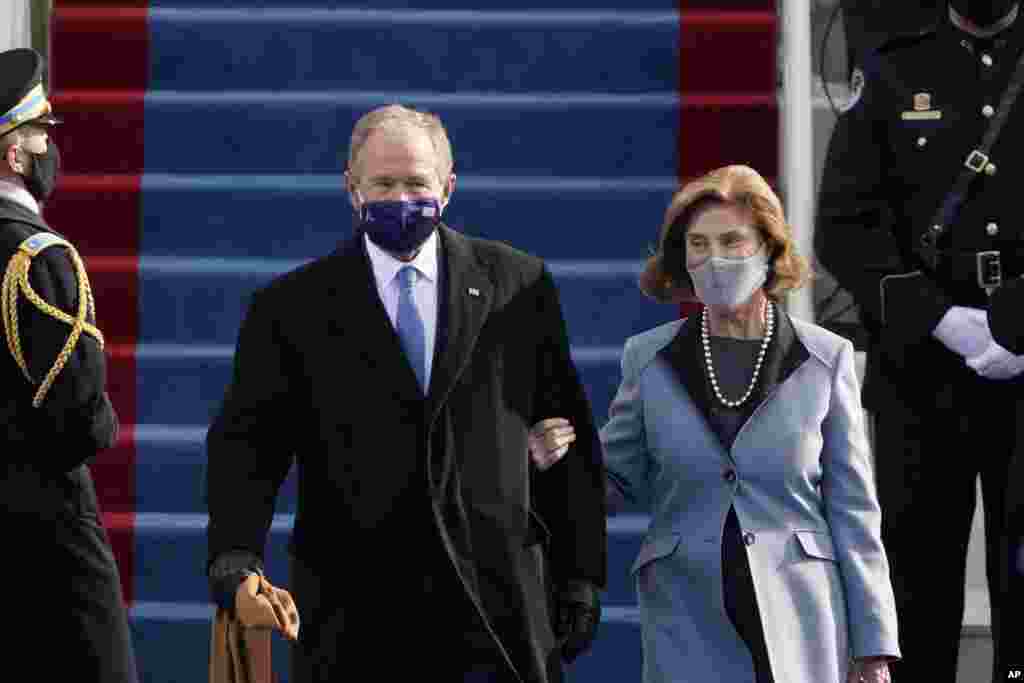 Former President George W. Bush and his wife Laura arrive for the 59th Presidential Inauguration at the U.S. Capitol for President-elect Joe Biden in Washington, Wednesday, Jan. 20, 2021.(AP Photo/Patrick Semansky, Pool)