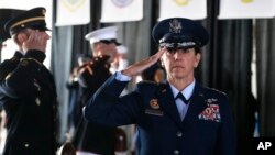 Air Force Gen. Lori Robinson, the incoming commander of NORAD and U.S. Northern Command, salutes during her arrival at the change of command ceremony, at Peterson Air Force Base, in Colorado Springs, Colo., May 13, 2016. 