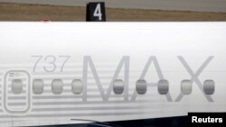 FILE -- A Boeing 737 MAX 8 aircraft is parked at a Boeing production facility in Renton, Washington, U.S., March 11, 2019. 