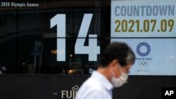 9일 일본 도쿄 거리에 올림픽 홍보 포스터가 걸려있다.