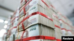 ក្រដាស​ប្រាក់​ថៃ​នៅ​ធនាគារKasikorn នៅ​ក្នុង​ក្រុង​បាងកក​ កាលពី​ថ្ងៃទី១២ ខែឧសភា ឆ្នាំ២០១៦។