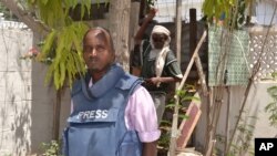 Le journaliste Abdiaziz Mohamed Ali Haji, à la radio Shabelle à Mogadiscio, en Somalie, 22 mars 2014.