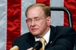 FILE - Rep. Jim Langevin, D-R.I., prepares the dais after he was chosen as speaker pro tempore for the opening day of the 116th Congress, at the Capitol in Washington, Jan. 3, 2019.