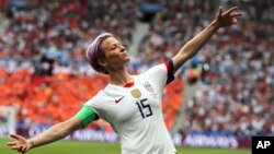 FILE - United States' Megan Rapinoe celebrates after scoring the opening goal during the Women's World Cup final soccer match between U.S. and The Netherlands at the Stade de Lyon in Decines, outside Lyon, France, July 7, 2019.