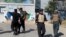 Afghan police arrive at the site of an attack at Kabul University in Kabul, Afghanistan, Nov. 2, 2020.