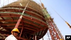 A Chinese engineer supervises at a construction site in Sudan's capital Khartoum (2012 photo)