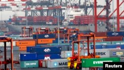 FILE - Shipping containers are seen at the Port Newark Container Terminal near New York City, July 2, 2009. 