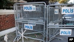 FILE - Security barriers block the road leading to Saudi Arabia's consulate in Istanbul, Turkey, Oct. 28, 2018.