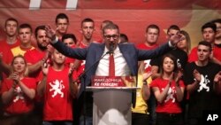 Hristijan Mickoski, the leader of the opposition VMRO-DPMNE party, speaks to his supporters during a protest in front of the government building in Skopje, Macedonia, June 2, 2018.