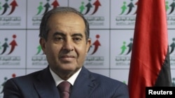 Mahmoud Jibril, kepala aliansi pasukan nasional Libya (NFA), dalam konferensi pers di Tripoli (8/7). 