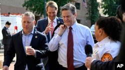 U.S. Representatives Josh Gottheimer, Jim Himes and Donald Norcross arrive at Democratic National Committee headquarters to discuss the 2024 election and President Joe Biden's candidacy, July 9, 2024, in Washington. Six of 213 House Democrats have said Biden should drop his bid.
