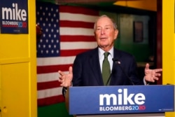 FILE - Democratic presidential candidate and billionaire Michael Bloomberg speaks to the media in Phoenix, Arizona, Nov. 26, 2019.