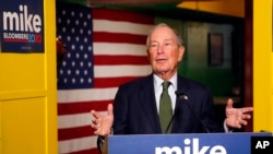 FILE - Democratic presidential candidate and billionaire Michael Bloomberg speaks to the media in Phoenix, Arizona, Nov. 26, 2019. 