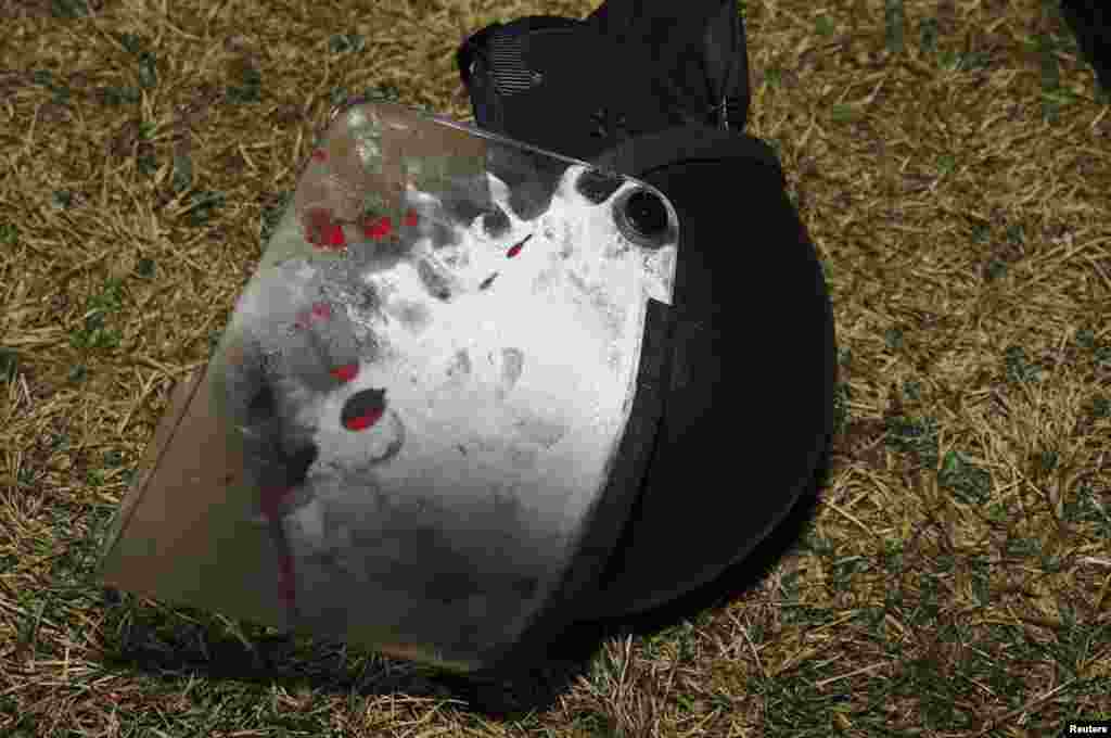 Police photo collected at the scene from the St. Louis County Police Crime Scene Unit shows a police helmet where two police officers were shot just after midnight in Ferguson, Mo.