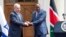Israeli Prime Minister Benjamin Netanyahu, left, and Kenyan President Uhuru Kenyatta shake hands at State House in Nairobi, Kenya, July 5, 2016. Netanyahu is in Kenya as part of his four-nation tour of Africa.