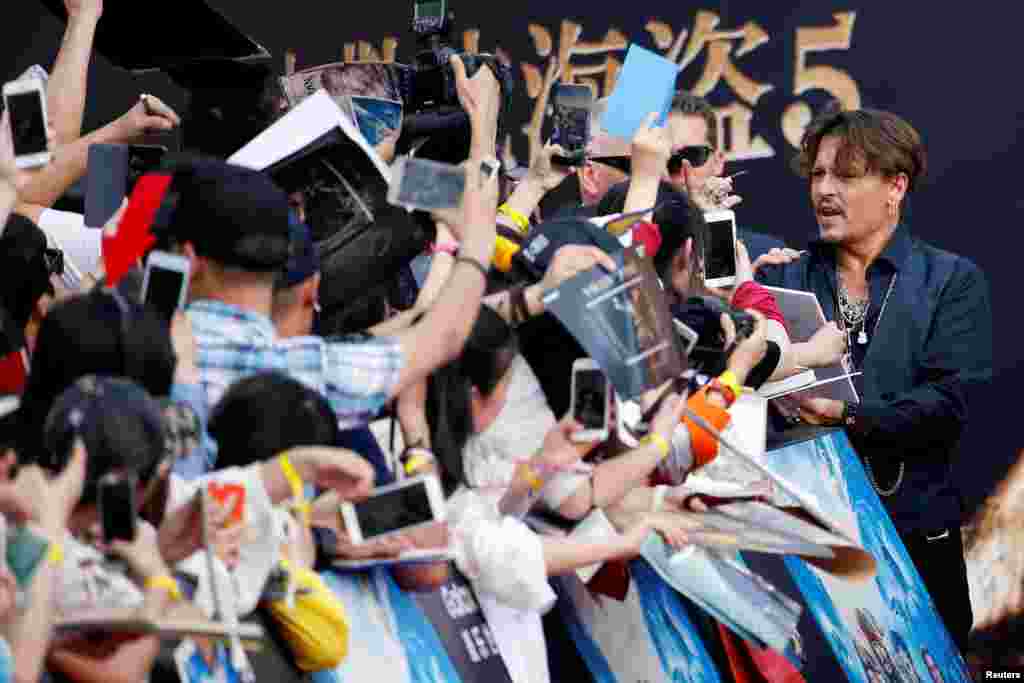 Actor Johnny Depp arrives for the global premiere of the film &quot;Pirates of the Caribbean: Dead Men Tell No Tales,&quot; in Shanghai, China.