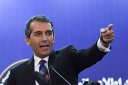 Sediq Sediqqi, spokesperson for the President of Afghanistan gestures as he speaks during a press conference in Kabul on Sept 8, 2019.