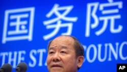 닝지저 중국 국가통계국장이 11일 베이징에서 기자회견을 하고 있다.