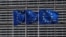 FILE - European Union flags flutter outside the EU Commission headquarters in Brussels, Belgium, May 5, 2021. 