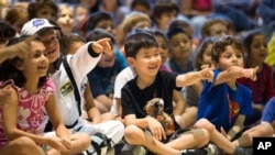 Children attending a summer school program in Cos Cob, Connecticut, last August. Educators are now discussing how to best teach English learners. (Chris Palermo/Hearst Connecticut Media via AP)