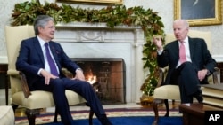 President Joe Biden speaks during a meeting with Ecuador's President Guillermo Lasso in the Oval Office of the White House, Dec. 19, 2022, in Washington. 
