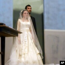 At the opening of the play a young Palestinian couple, played by Haroutioun Izmirilian and Samira al-Asir (front), stands in their home in Haifa, which is now an Israeli City.