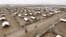 An aerial view shows recently constructed houses at the Kakuma refugee camp in Turkana District, northwest of Kenya's capital Nairobi, June 20, 2015.
