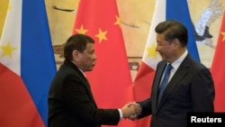 杜特尔特上任后不久就在2016年10月访问北京（路透社）