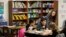 Chelsea Duvenez, upper right, works with students in her fourth-grade classroom at Olympic View Elementary School, Friday, March 9, 2018, in Lacey, Wash. (AP Photo/Ted S. Warren)