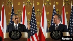 U.S. President Barack Obama and British Prime Minister David Cameron hold a news conference following their meeting at 10 Downing Street in London, Britain, April 22, 2016. 