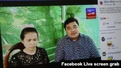 Sok Oudom, right, sitting next to an unidentified woman, talks about Kampong Chhnang court's handling of a criminal case during a live broadcast on “Rithysen News” via Facebook, on Wednesday, May 13, 2020. (Courtesy of Facebook)