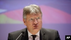 Jörg Meuthen, leader of Alternative For Germany party, talks to journalists during a press conference in Milan, April 8, 2019.