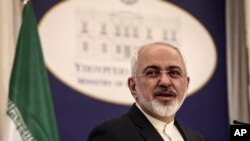 FILE - Iranian Foreign Minister Mohammad Javad Zarif addresses journalists during a news briefing.